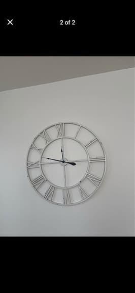 Mio väggklocka metall med romerska siffror