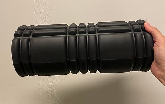 Svart foam roller träningsrulle