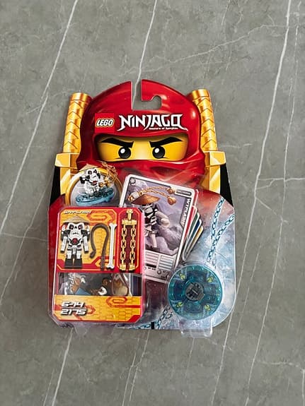 Oöppnad LEGO Ninjago spinnerset