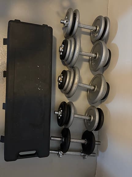 Hantelset med lösa vikter och förvaringslåda