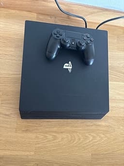 Sony Playstation 4 Pro + spelkonsol svart