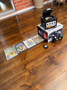 Nintendo GameCube spelkonsol med handkontroll och spel