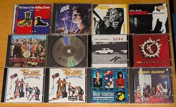 110 st Cd-skivor & singlar hårdrock, rock, pop, disco och svenskt.