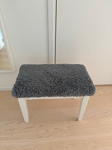 Pall med fårfällssits