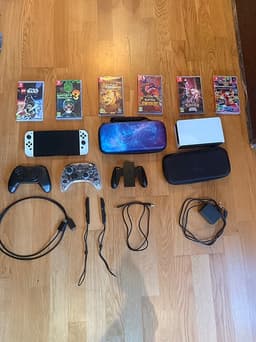 Nintendo Switch OLED vit med spel och tillbehör