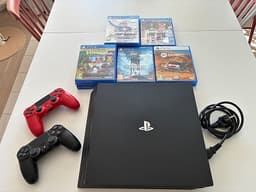 PS4 Pro 1TB + 2 kontroller & spel – redo att spela