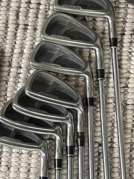 Golfset med järnklubbor och drivers