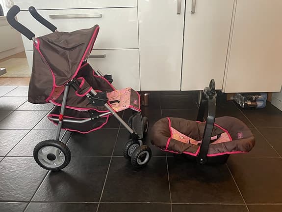 Brio dockvagn med Sittdel och babyskydd, brun/rosa