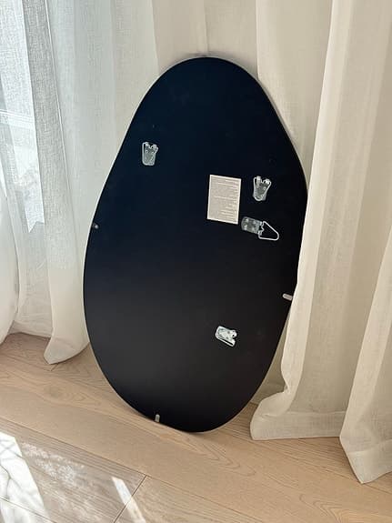 H&M Home spegel organisk form