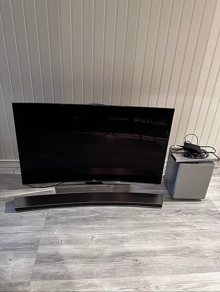 Samsung 55” Curved 4K TV + Soundbar & Subwoofer