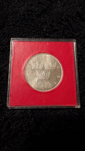 Svenskt 50 kronors jubileumsmynt i kapsel