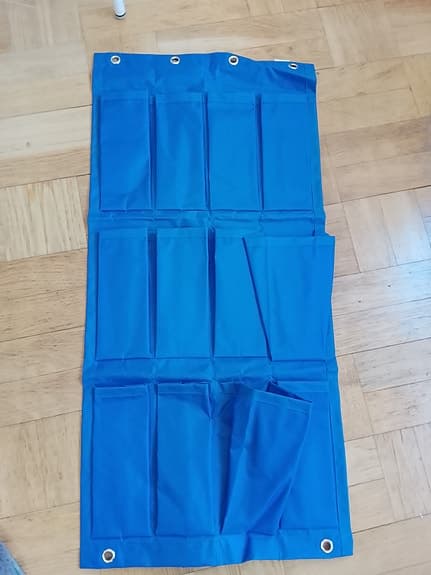 Blå förvaringsficka väggförvaring med flera fack