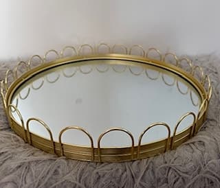Oval spegelbricka med guldram