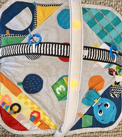 Baby Einstein Babygym lekmatta med bågar och leksaker