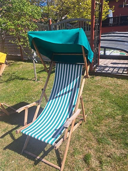 Solstolar med tak trä gul och turkos