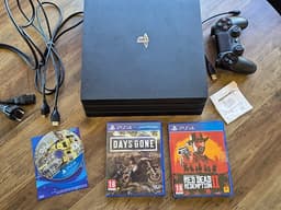 PS4 Pro 1 TB med handkontroll och spel