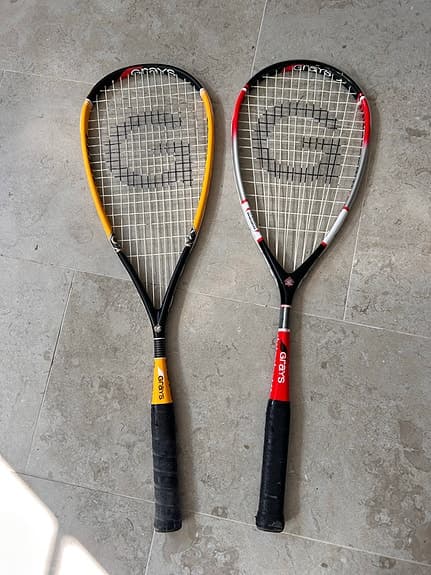 Grats squashracket svart/röd och svart/gul