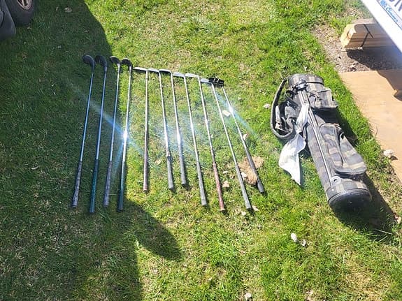 Golfklubbor med bag