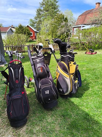 Golfset med bagar och vagnar