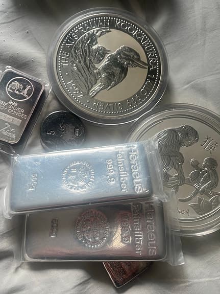 silvermynt och silvertackor