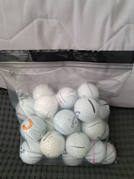 Begagnade golfbollar i olika mixar