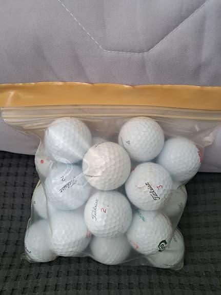 Begagnade golfbollar i olika mixar