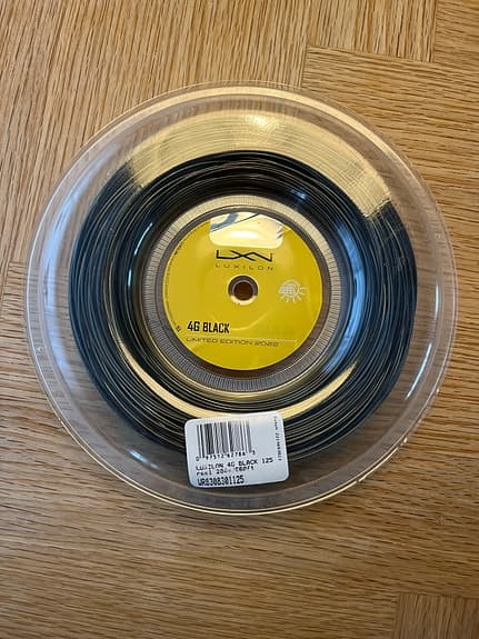 Luxilon 4G Black tennissena svart