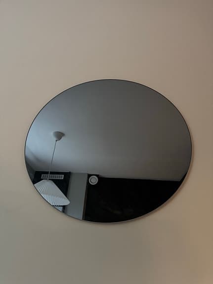 Rund spegel med tonat glas