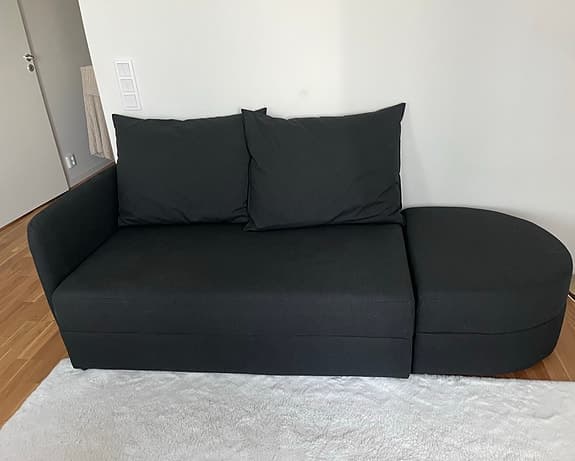 Svart bäddsoffa