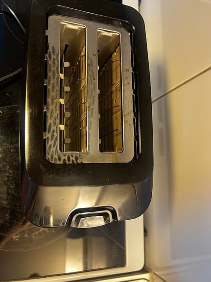 Snygg och smidig brödrost i pianosvart finish