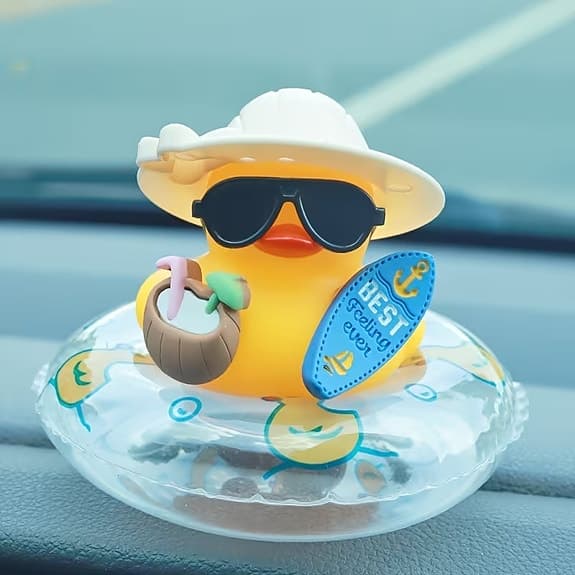 Gummianka med solhatt och solglasögon