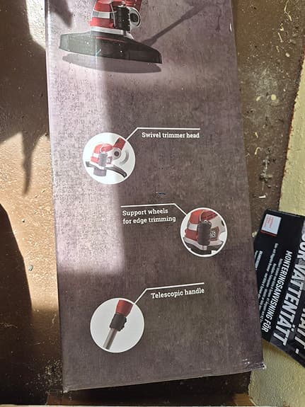 Röd grästrimmer kantklippare
