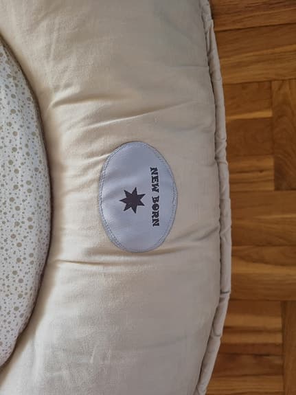 Newborn babynest beige med mönstrad insida