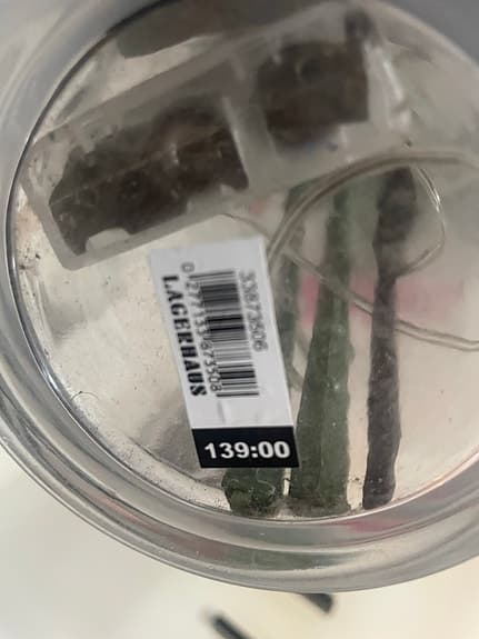 Lagerhaus hög glasvas med konstgjorda blommor