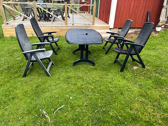 Trädgårdsgrupp plastbord med 4 stolar svart