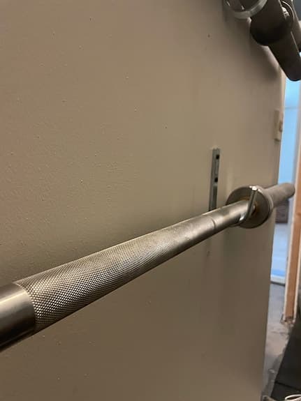 Skivstång för styrketräning i stål