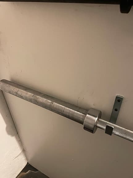 Skivstång för styrketräning i stål