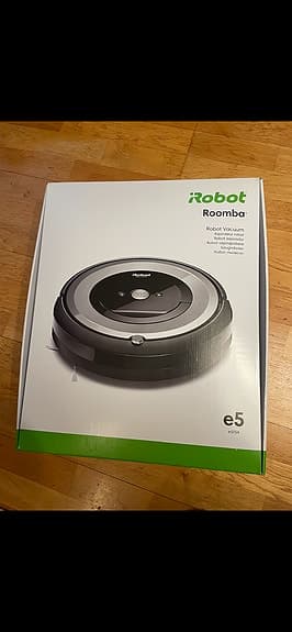 Helt ny robotdammsugare i kartong