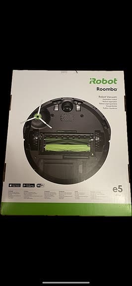 Helt ny robotdammsugare i kartong