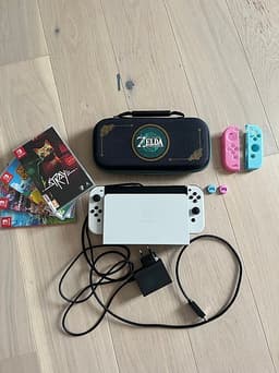 Nintendo Switch OLED vit med spel och Zelda-väska