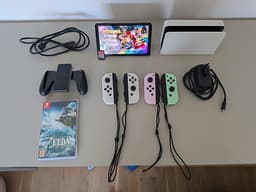 Nintendo Switch OLED med extra par Joy-Con, Mario Kart och Zelda