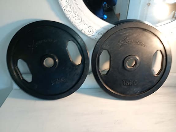 Två stycken viktskivor 15 kg 50mms hål för skivstång eller användas separat