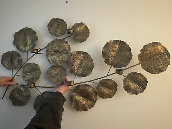Väggdekoration med ljushållare