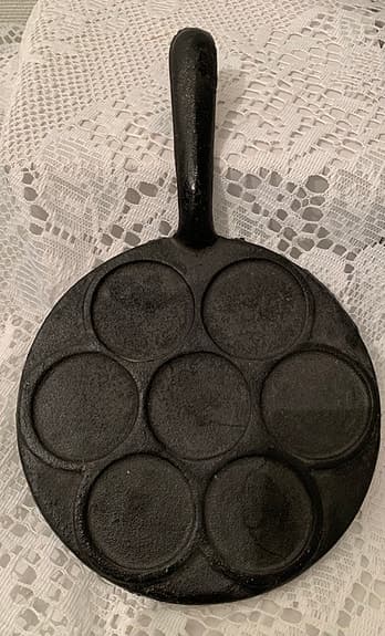 Ljusstake i form av en plättlagg