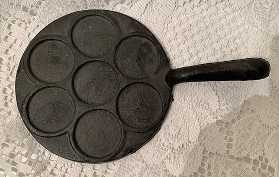 Ljusstake i form av en plättlagg