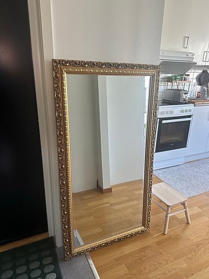 Mirror with golden frame