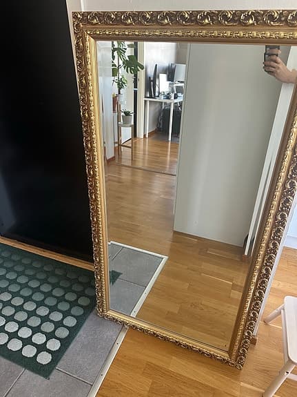 Mirror with golden frame