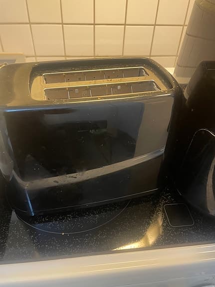 Svart brödrost med två fack