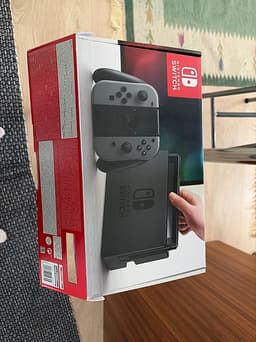 Nintendo Switch spelkonsol med Joy-Con och spel