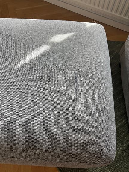 Fåtölj med tillhörande fotpall
